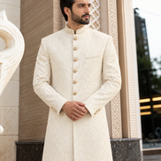 Men’s ivory embroidered sherwani with intricate damask pattern and traditional collar